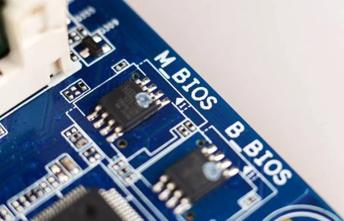 Close-up of a firmware memory chip on a circuit board storing device firmware